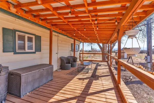 a balcony with wooden floor