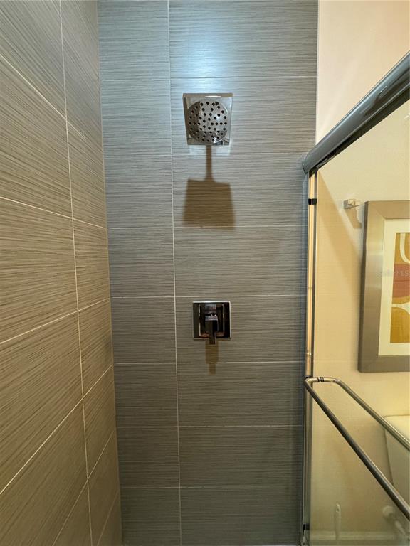 1641 Retreat Circle Clermont, FL 34714 - Photo 14 of 16 a bathroom with a shower