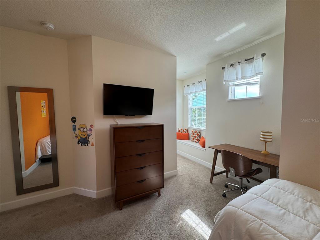 1641 Retreat Circle Clermont, FL 34714 - Photo 7 of 16 a view of a livingroom with furniture and a window