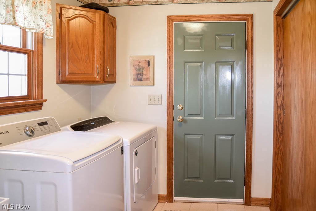 2555 Fixler Road Wadsworth, OH 44281 - Photo 24 of 35 First floor laundry room with pocket door leading into the kitchen or garage.