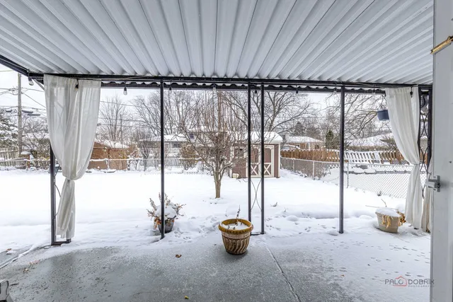 a view of living room with windows
