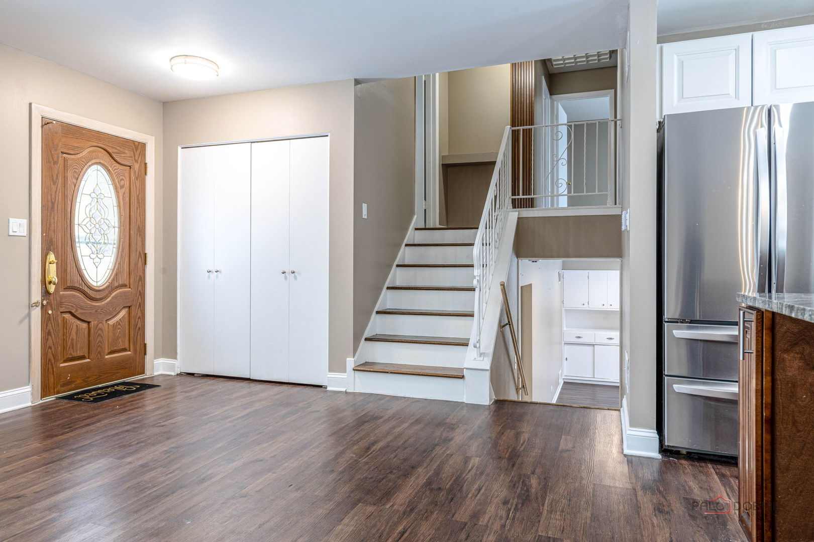681 South Mt Prospect Road Des Plaines, IL 60016 - Photo 5 of 20 a view of a kitchen with wooden floor and electronic appliances