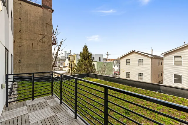 a view of a house with a balcony