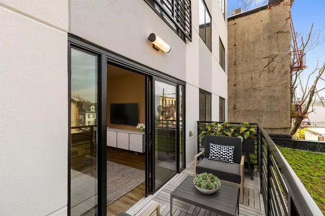 a balcony view with a couch