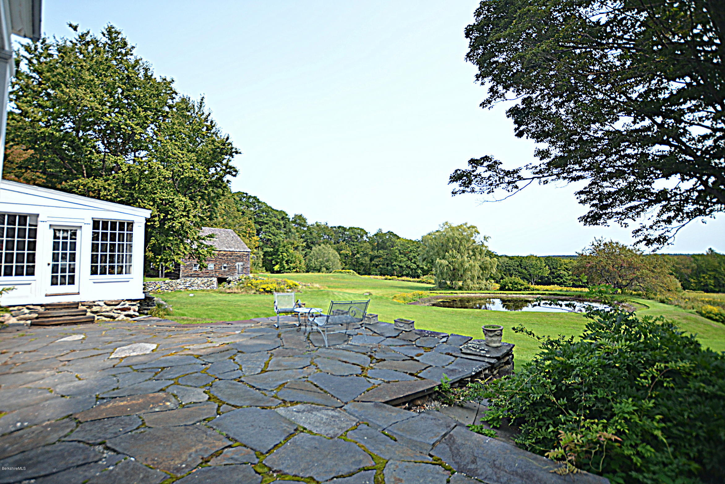 128 Chipman Road Middlefield, MA 01011 - Photo 11 of 61 a view of a big yard with large trees