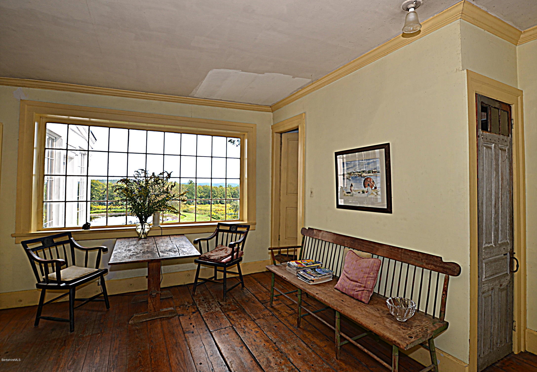 128 Chipman Road Middlefield, MA 01011 - Photo 20 of 61 a living room with furniture and a window