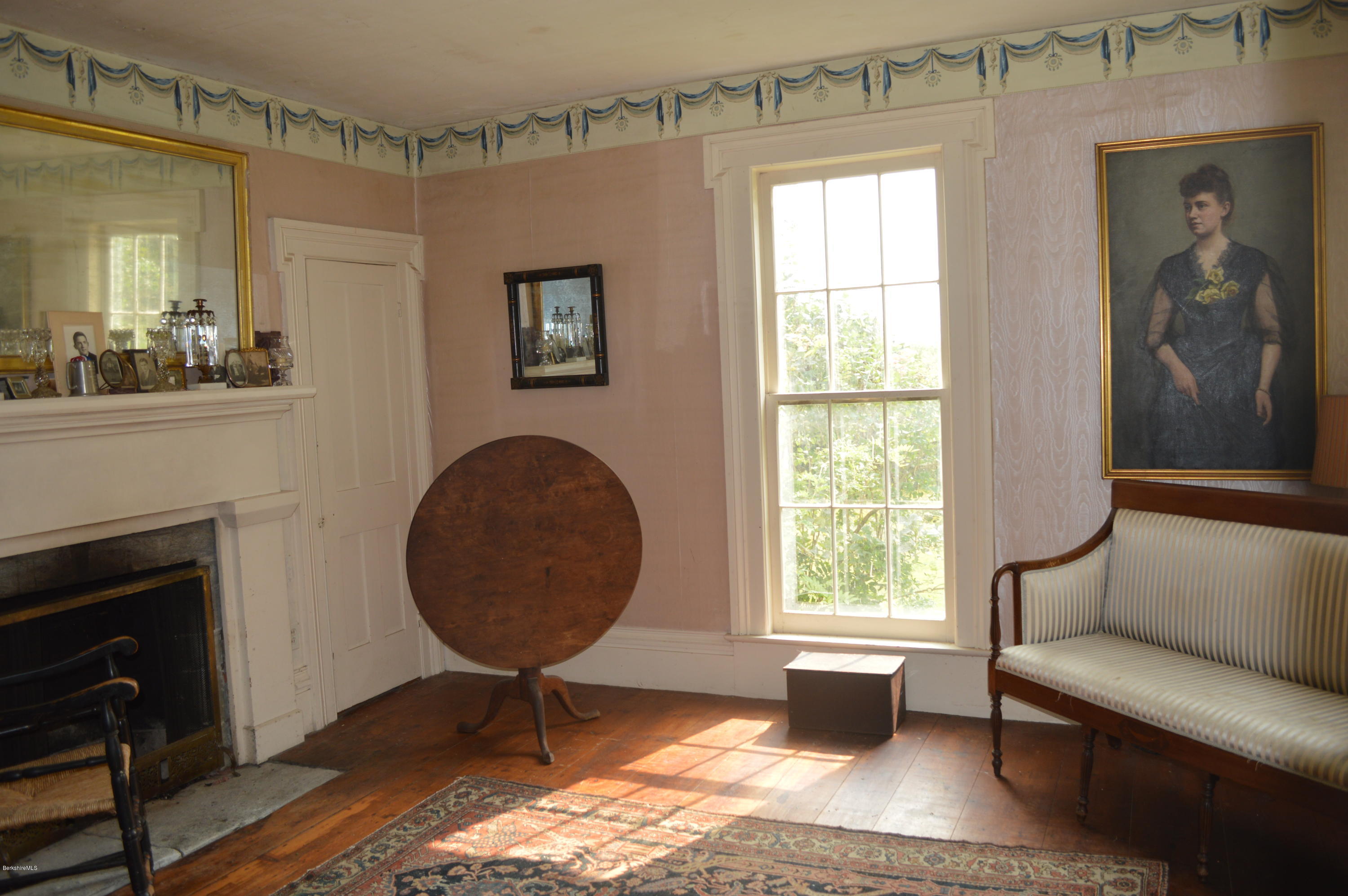 128 Chipman Road Middlefield, MA 01011 - Photo 26 of 61 a living room with furniture a window and a fireplace