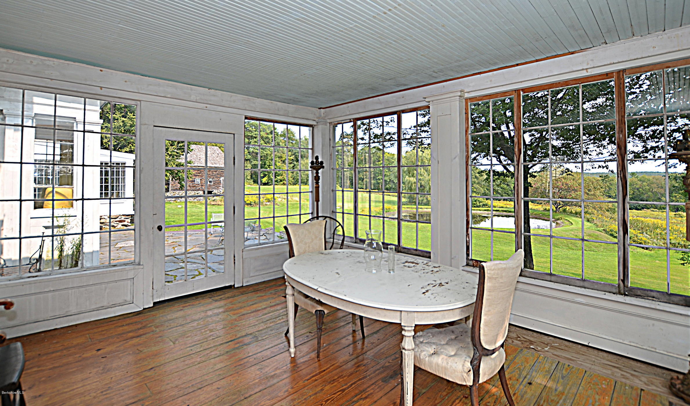 128 Chipman Road Middlefield, MA 01011 - Photo 28 of 61 a view of a room with furniture and large windows