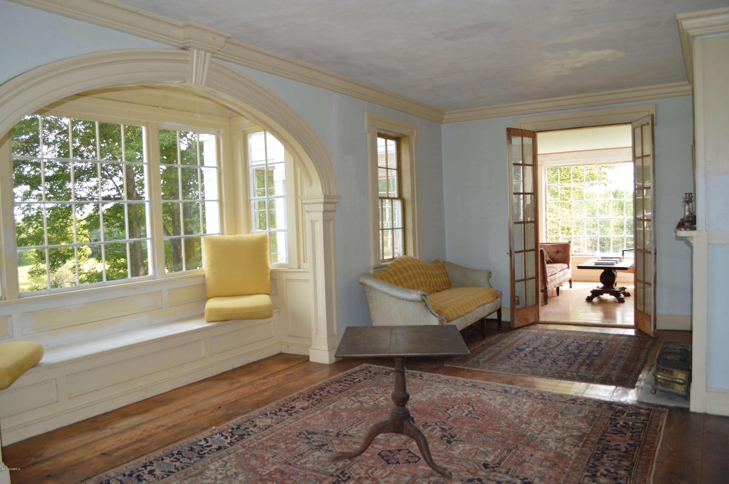 128 Chipman Road Middlefield, MA 01011 - Photo 31 of 61 a living room with furniture and a large window