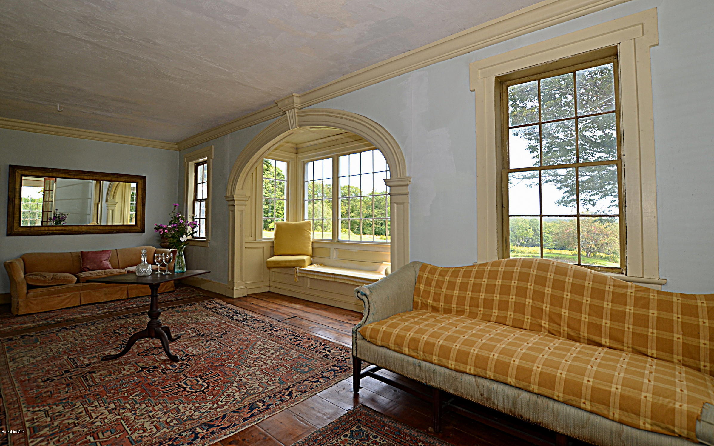 128 Chipman Road Middlefield, MA 01011 - Photo 35 of 61 a living room with furniture and a window