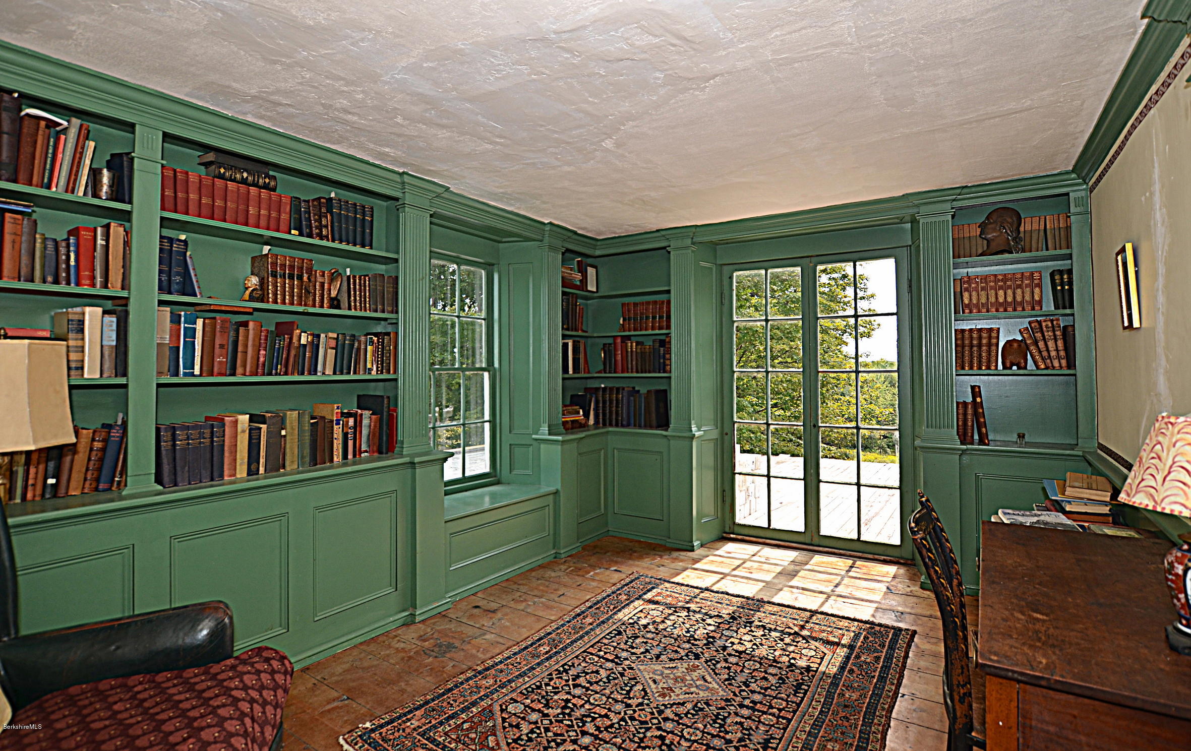 128 Chipman Road Middlefield, MA 01011 - Photo 36 of 61 a room with window and book shelf
