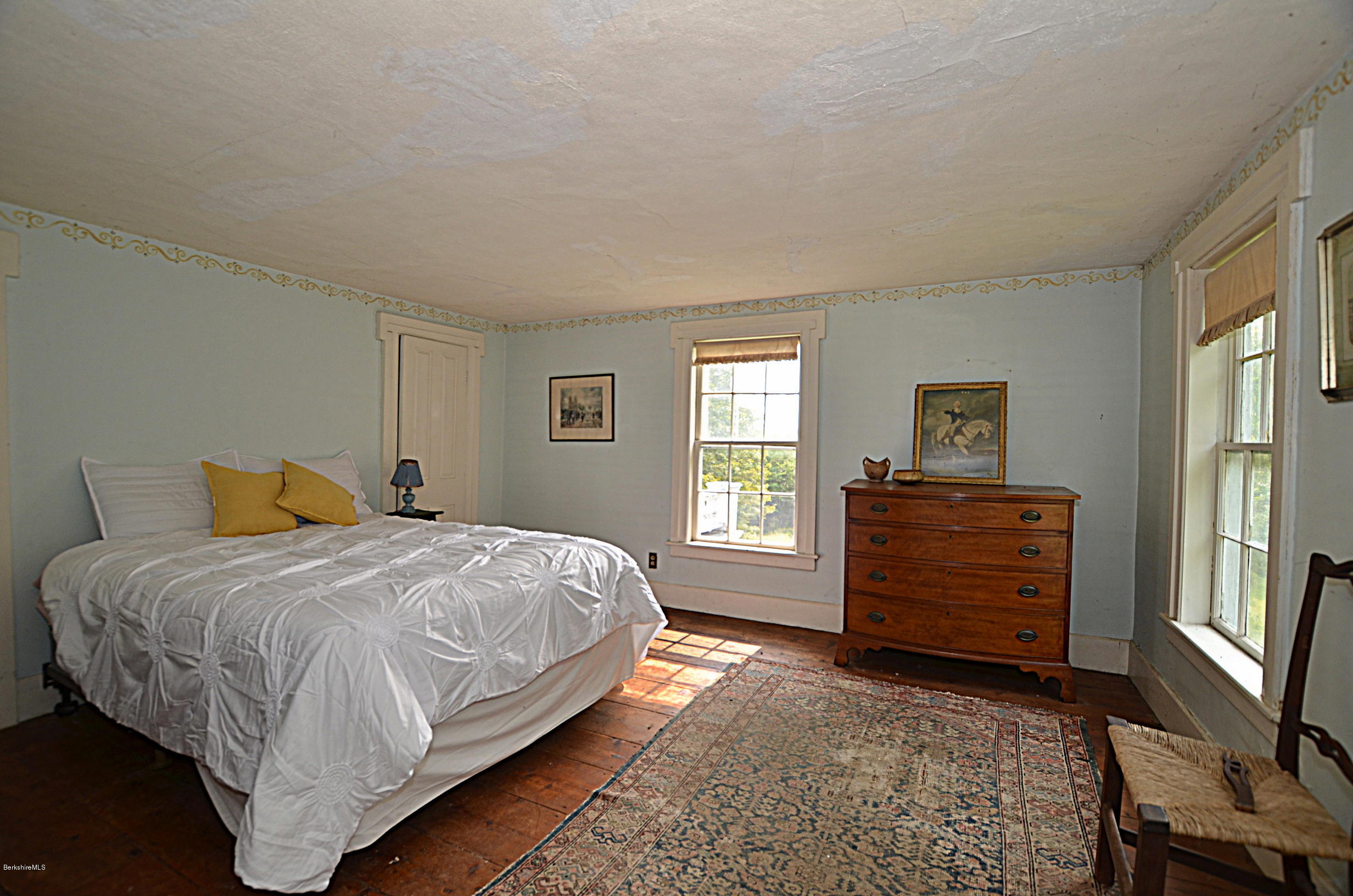 128 Chipman Road Middlefield, MA 01011 - Photo 37 of 61 a bedroom with a bed and a window