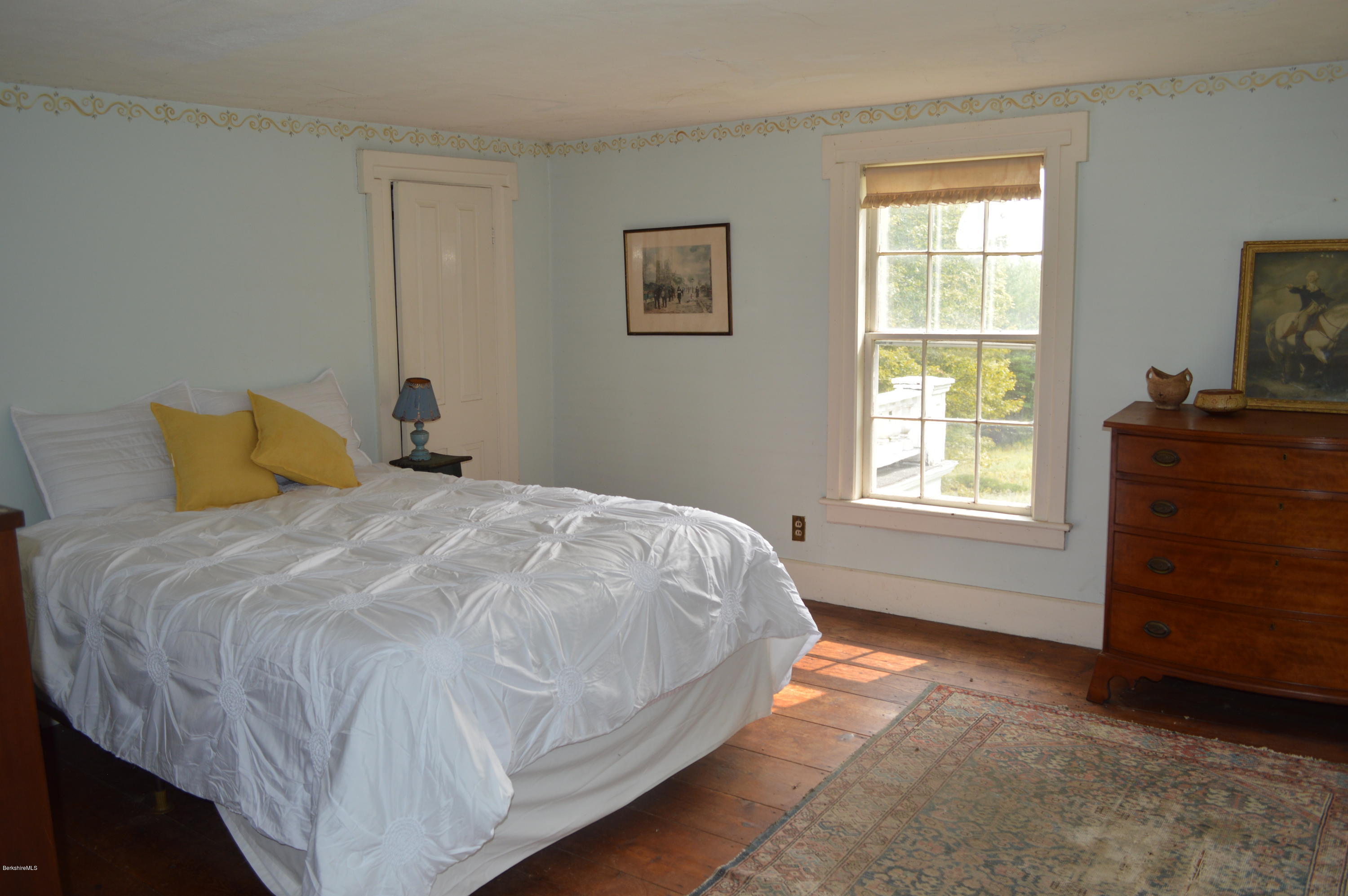 128 Chipman Road Middlefield, MA 01011 - Photo 45 of 61 a bedroom with a bed and a window