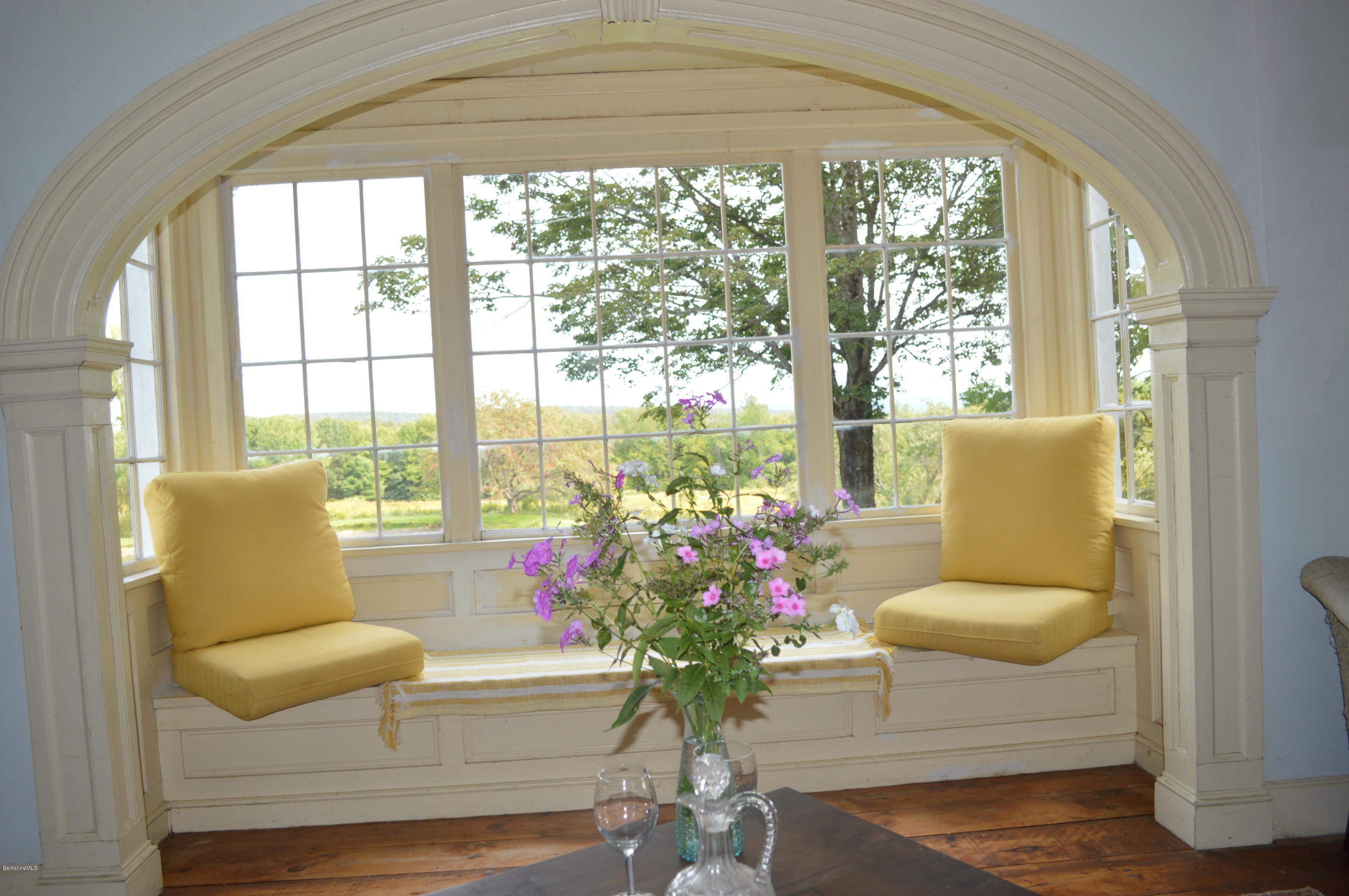 128 Chipman Road Middlefield, MA 01011 - Photo 8 of 61 a living room with furniture and a large window