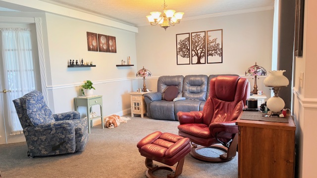 3361 Turner Drive Springfield, OH 45504 - Photo 5 of 18 This inviting living room offers comfort and ample space for relaxation and gatherings.