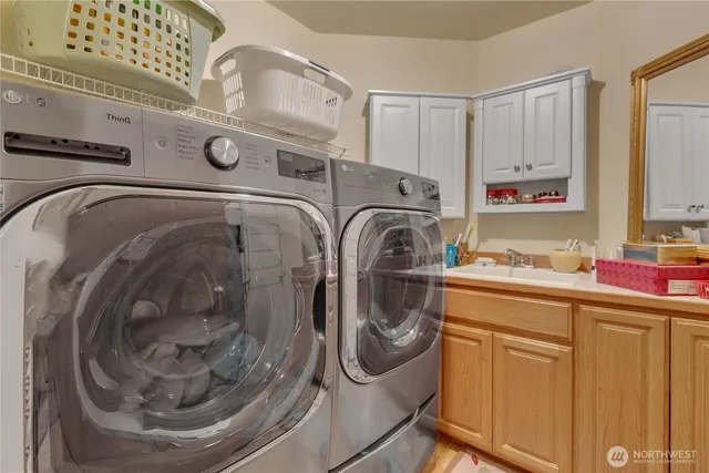 a utility room with dryer and washer