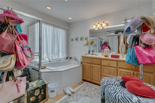 a very nice looking room with a lot of stuff and furniture