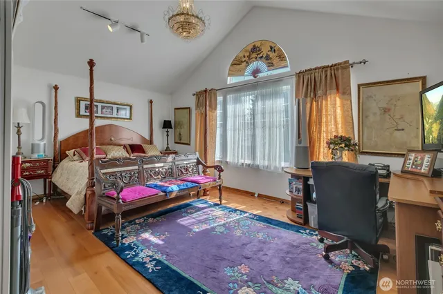 a bedroom with furniture and a window