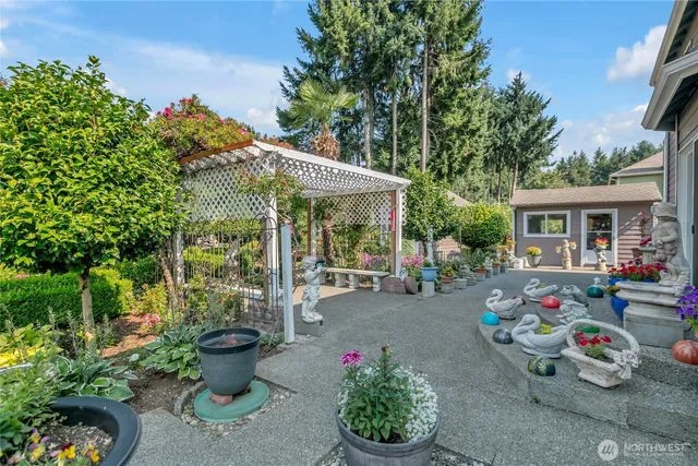 a garden view with a seating space