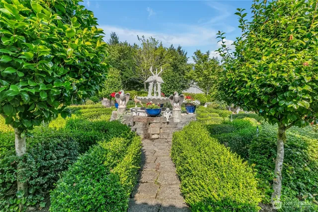 a view of a pathway with a park