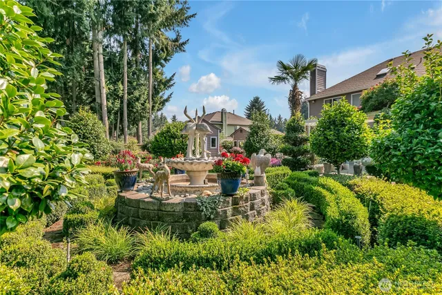 an aerial view of a house with a garden