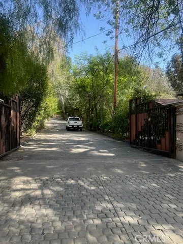 a view of a car parked in front of a house