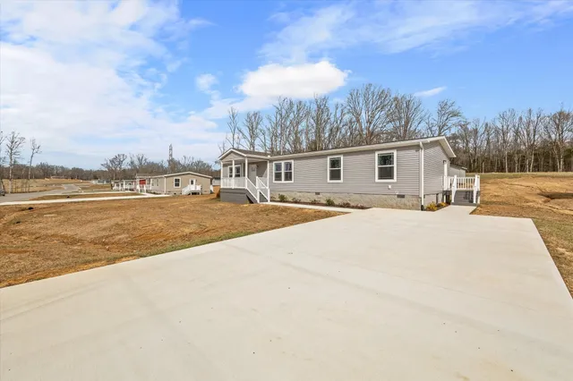 a view of a terrace with a yard
