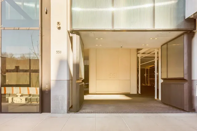a kitchen with a refrigerator and countertop