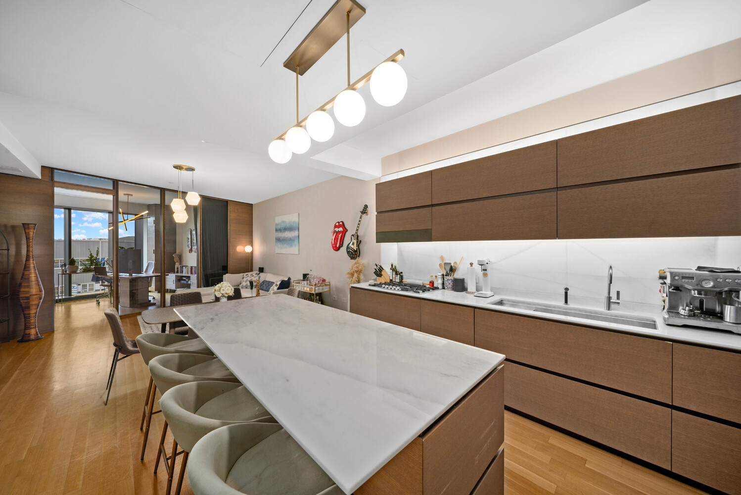 551 West 21st Street, Unit 4B Manhattan, NY 10011 - Photo 2 of 20 a large kitchen with a table and chairs