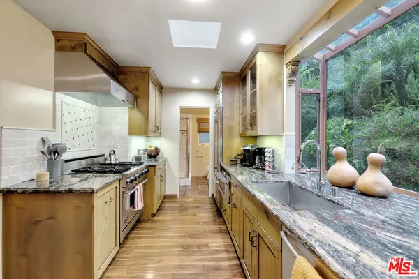 a bedroom with a bed and a fireplace