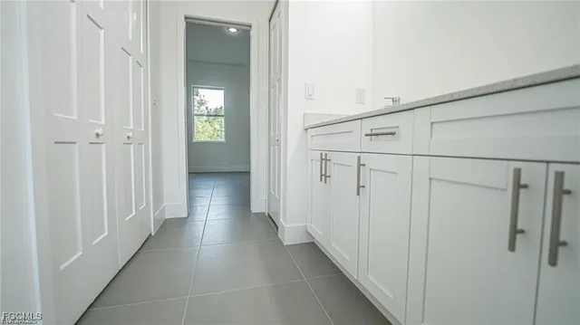 a view of a hallway with white walls