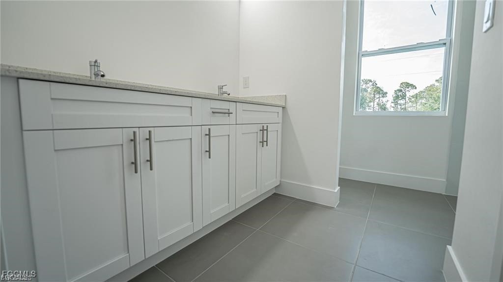 744 Clancy Street East Lehigh Acres, FL 33974 - Photo 9 of 14 a view of an empty room