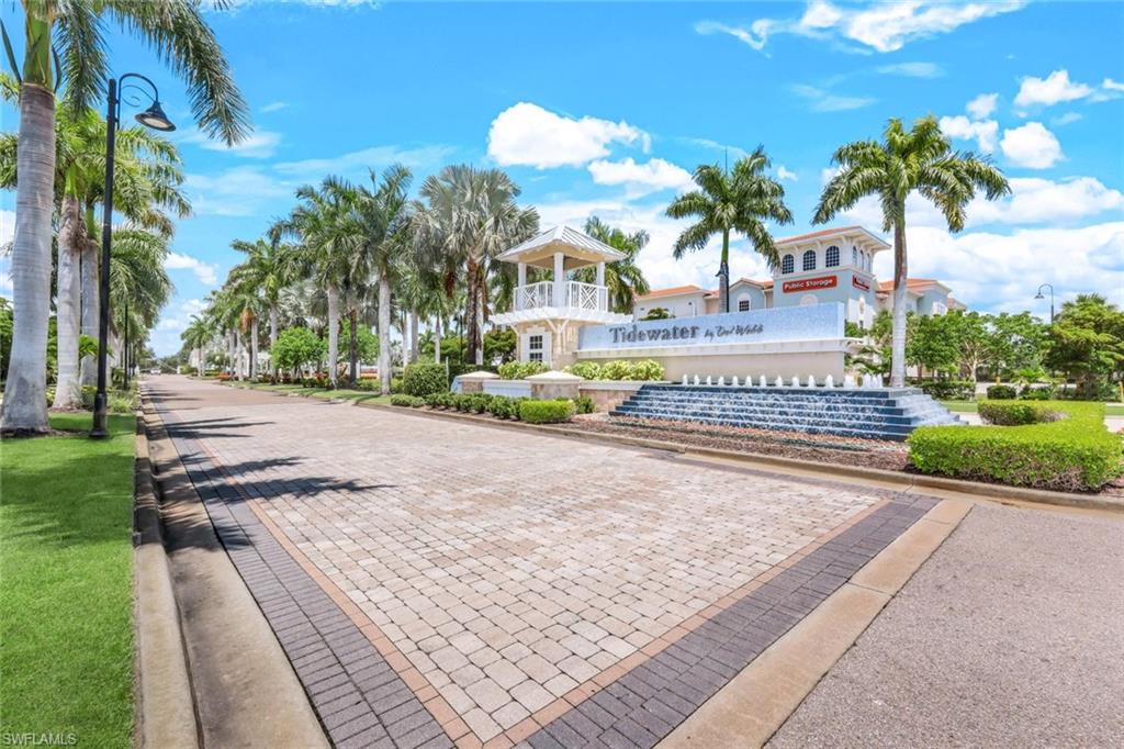 10787 Manatee Key Lane Estero, FL 33928 - Photo 22 of 31 a view of a house with a yard