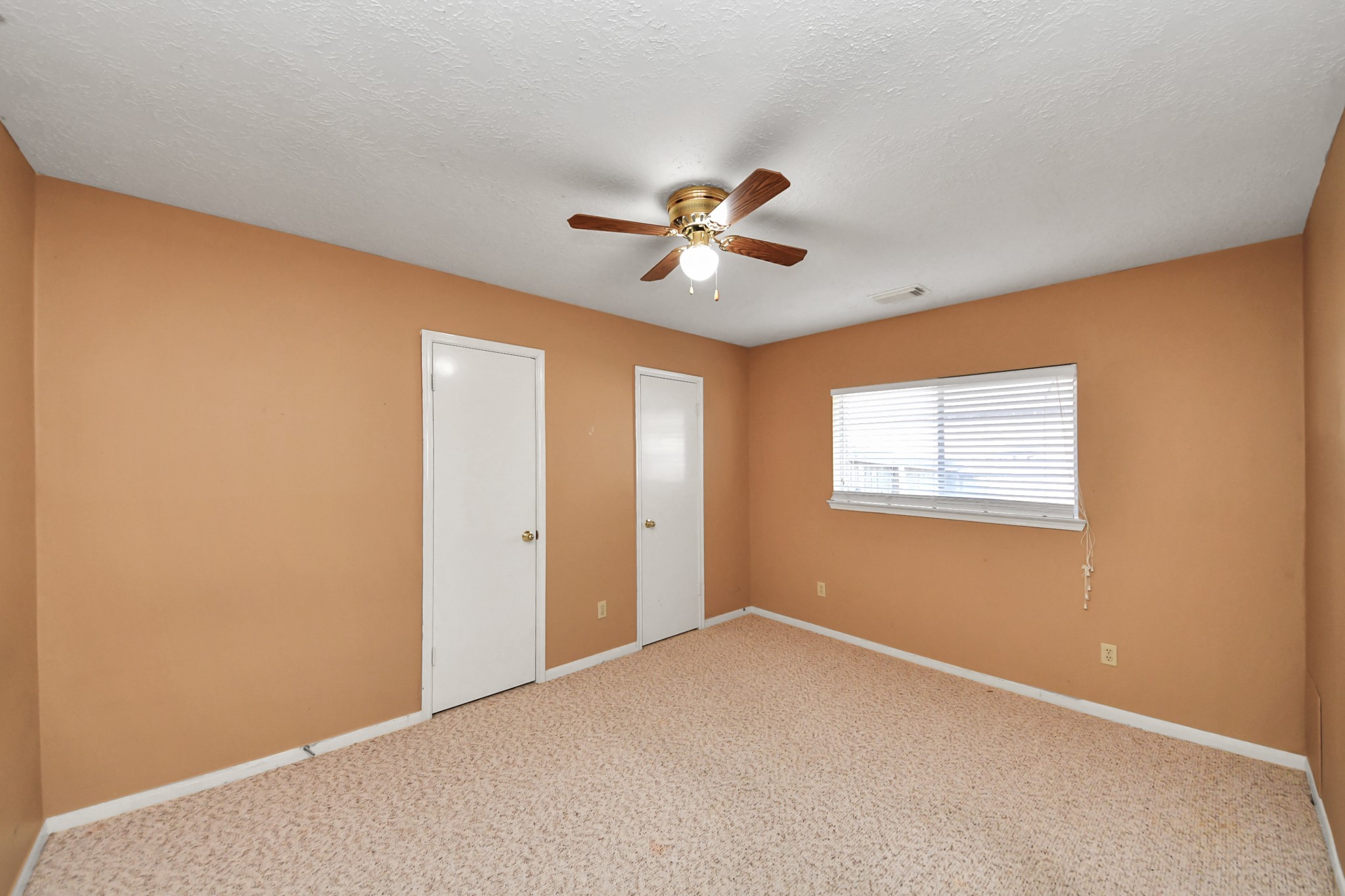 3310 Keygate Drive Spring, TX 77388 - Photo 34 of 45 an empty room with a ceiling fan and a window