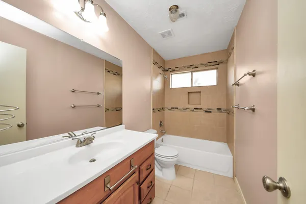 a view of backyard with green space