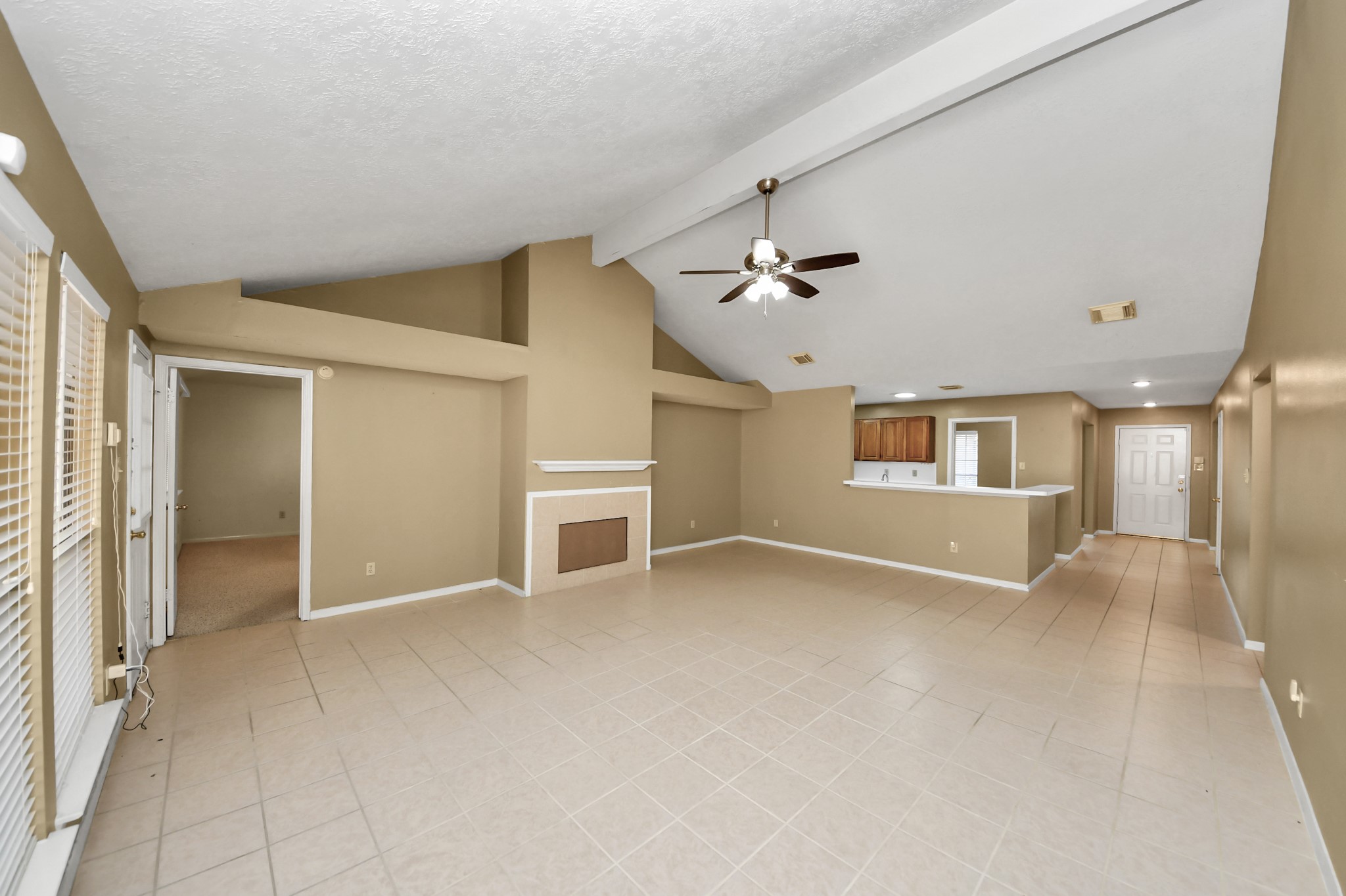 3310 Keygate Drive Spring, TX 77388 - Photo 4 of 45 an empty room with windows and ceiling fan