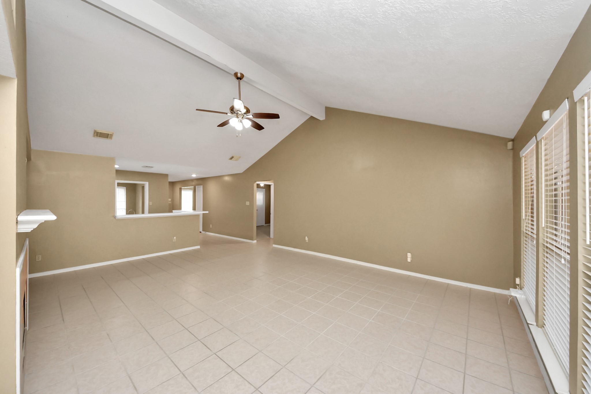 3310 Keygate Drive Spring, TX 77388 - Photo 6 of 45 an empty room with ceiling fan and windows