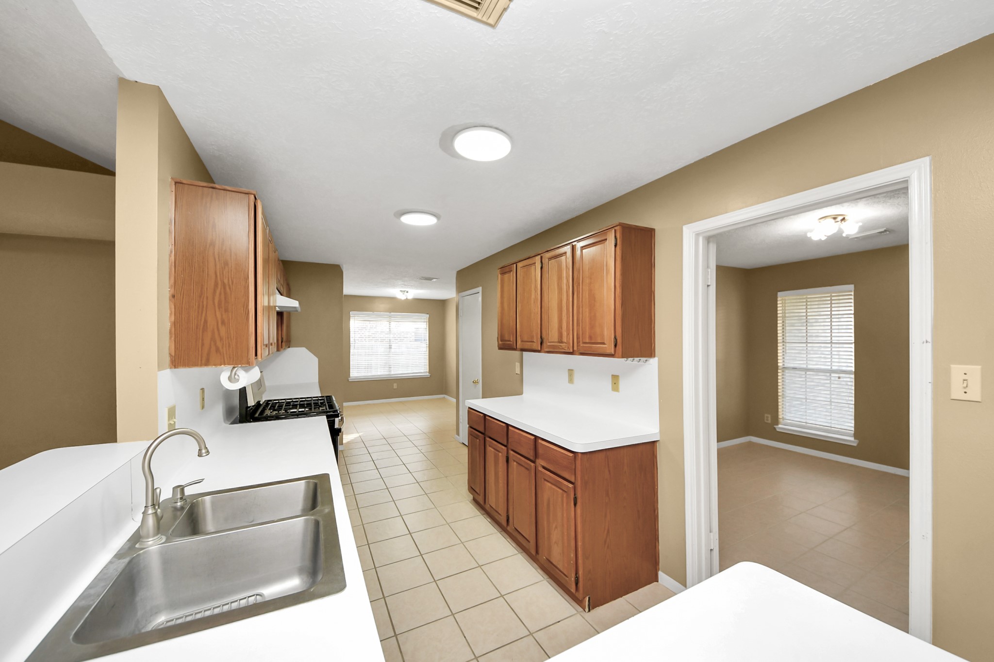 3310 Keygate Drive Spring, TX 77388 - Photo 10 of 45 a bathroom with a tub sink and mirror