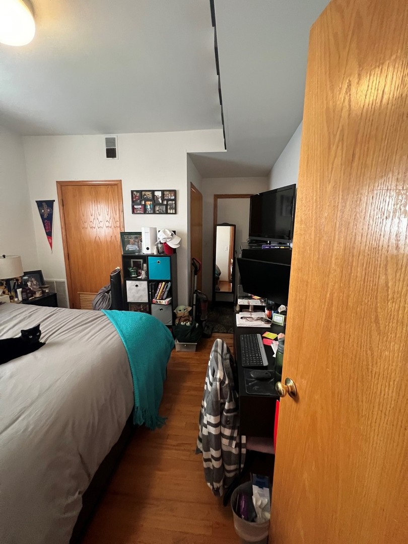 628 West Patterson Avenue, Unit 3S Chicago, IL 60613 - Photo 10 of 10 a bedroom with bed furniture and a window