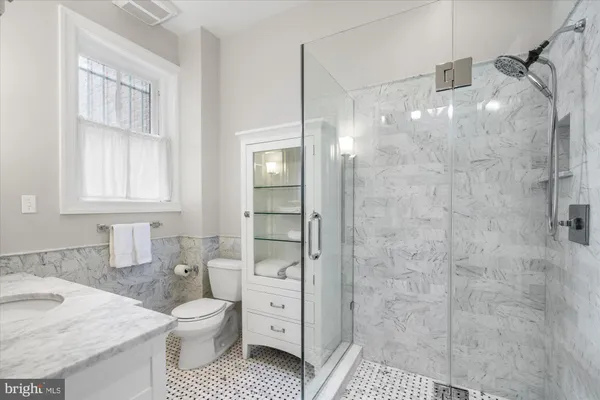 a view of a hallway view with staircase