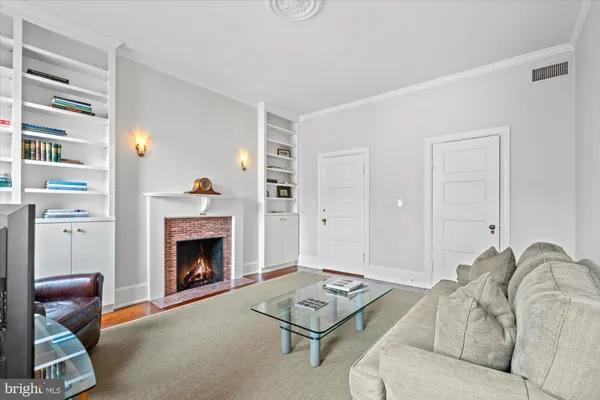 a bed room with a bed and a fireplace