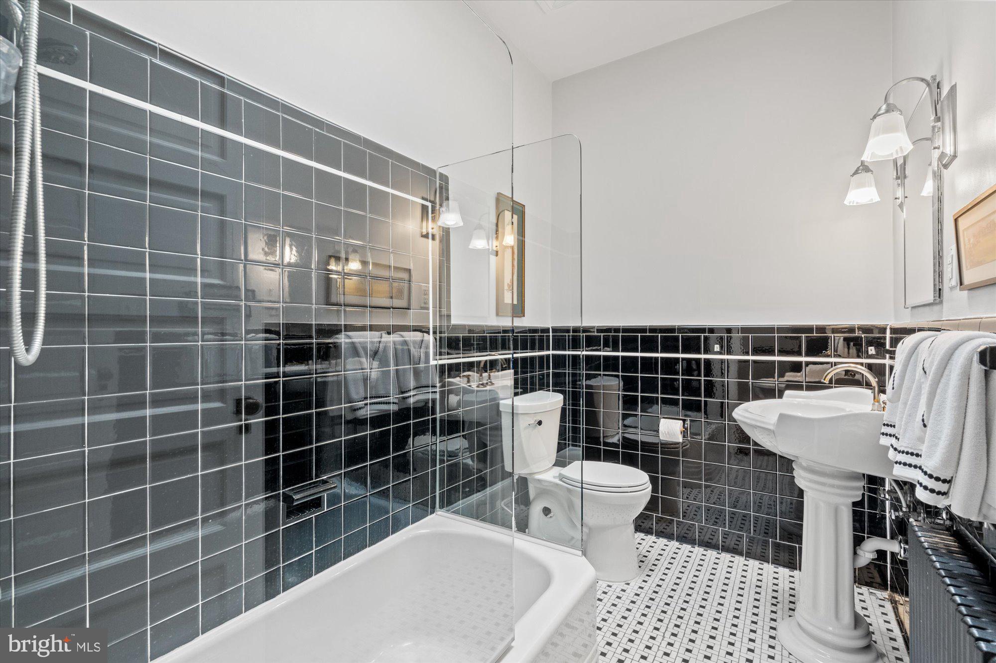 2021 Q Street Northwest Washington, DC 20009 - Photo 38 of 57 Renovated third floor bathroom