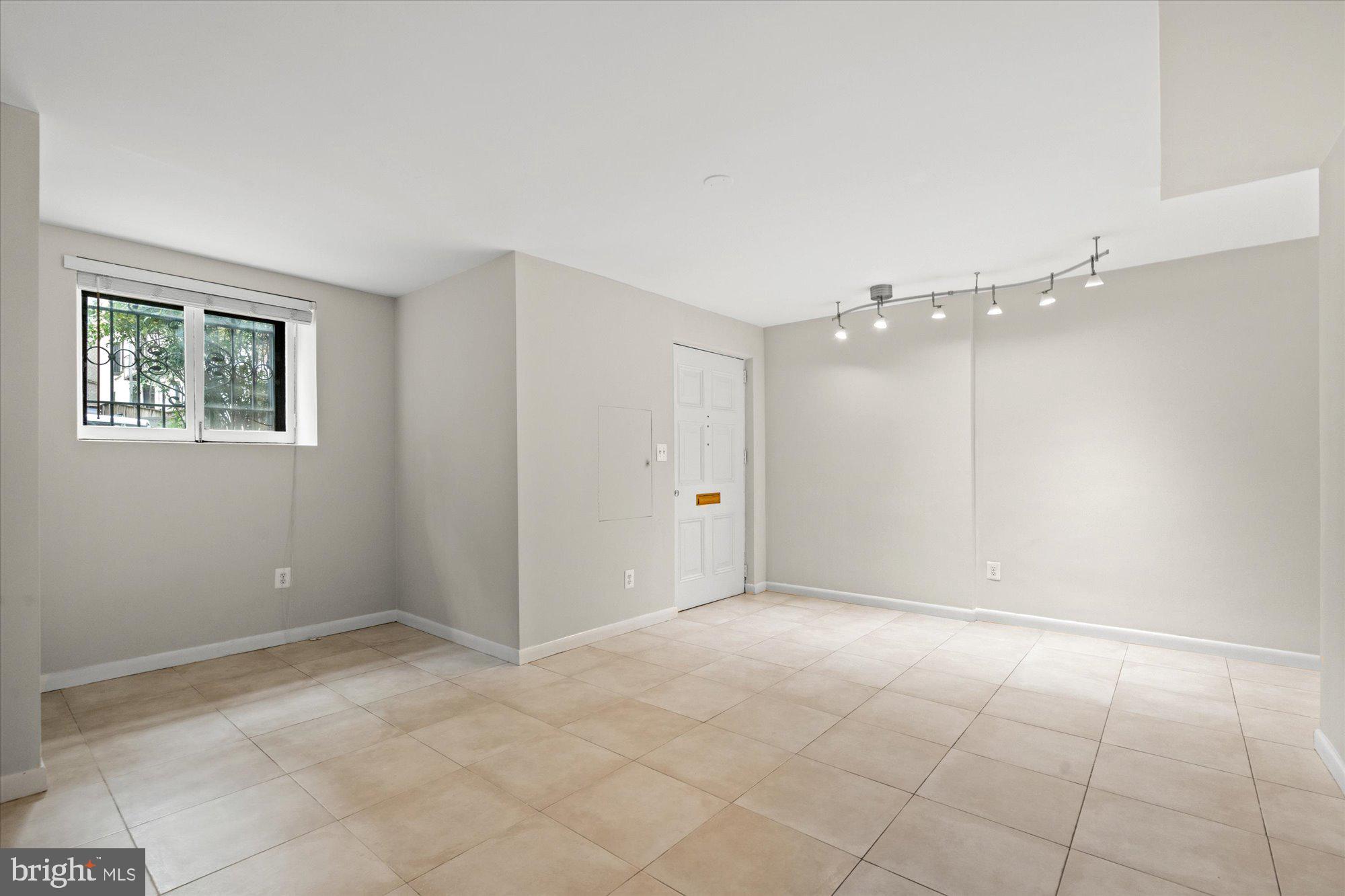 2021 Q Street Northwest Washington, DC 20009 - Photo 43 of 57 Recently renovated lower level living room