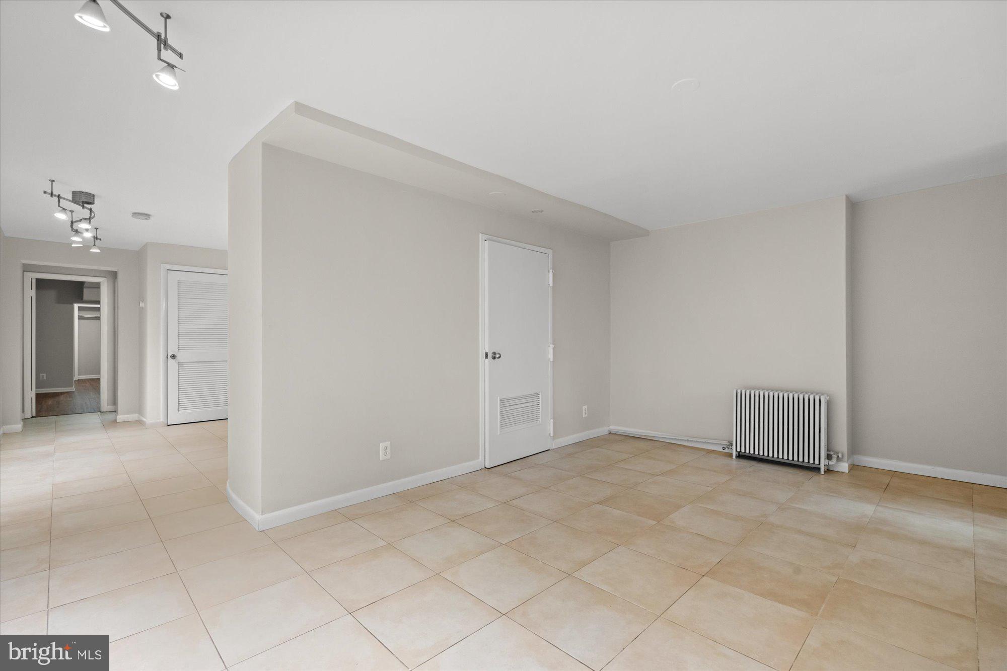 2021 Q Street Northwest Washington, DC 20009 - Photo 44 of 57 Lower level apartment living space