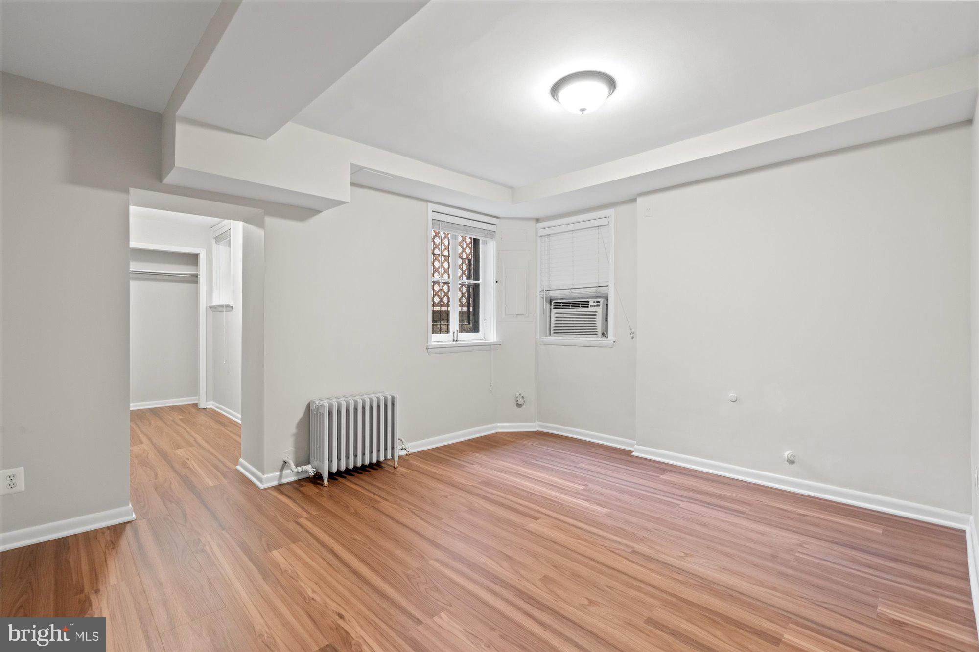 2021 Q Street Northwest Washington, DC 20009 - Photo 52 of 57 Lower level bedroom with new flooring