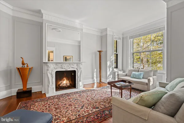 a view of a livingroom with furniture and front door