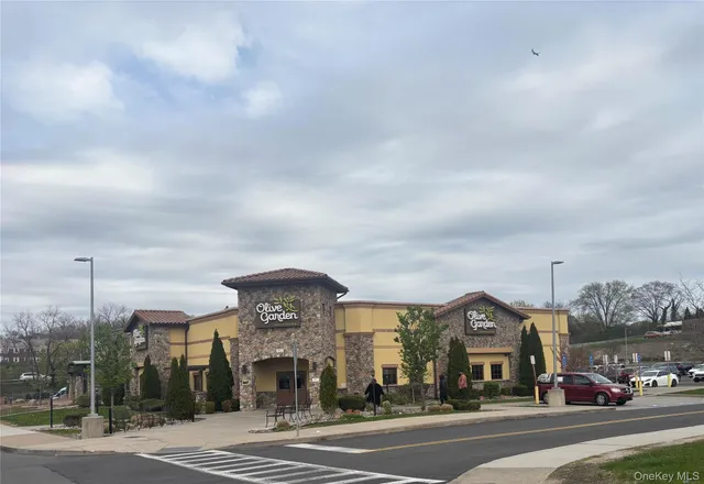 a view of a building and a street