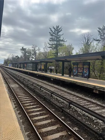 a view of a train track and platform