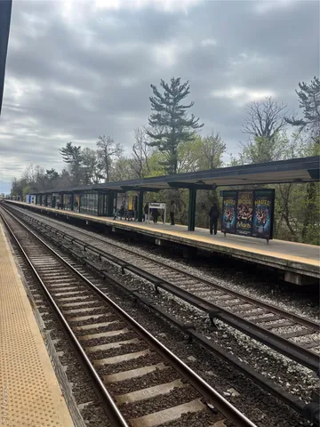 a view of a train track and platform