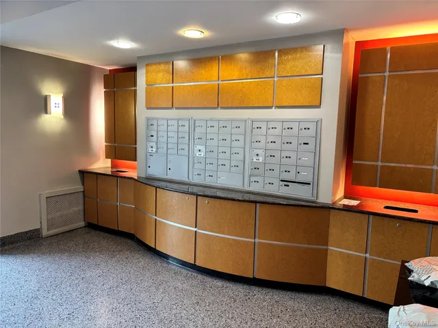 a living room with a couch and a window